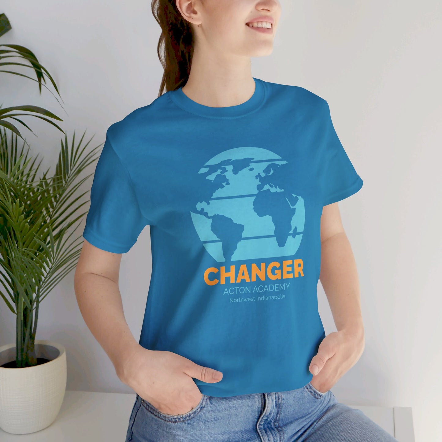 Acton NW Indy World Changer Unisex Jersey Short Sleeve Tee