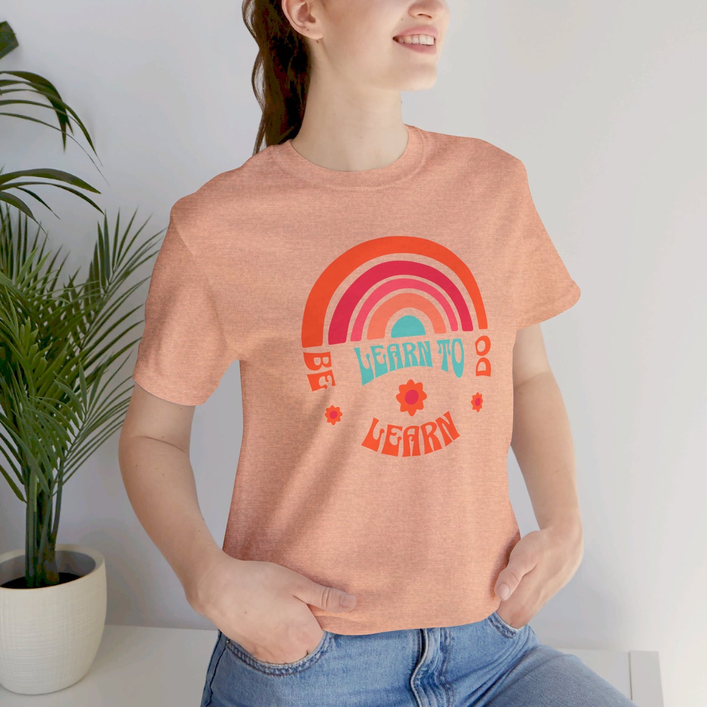 Learn to Be Rainbow Unisex Jersey Short Sleeve Tee