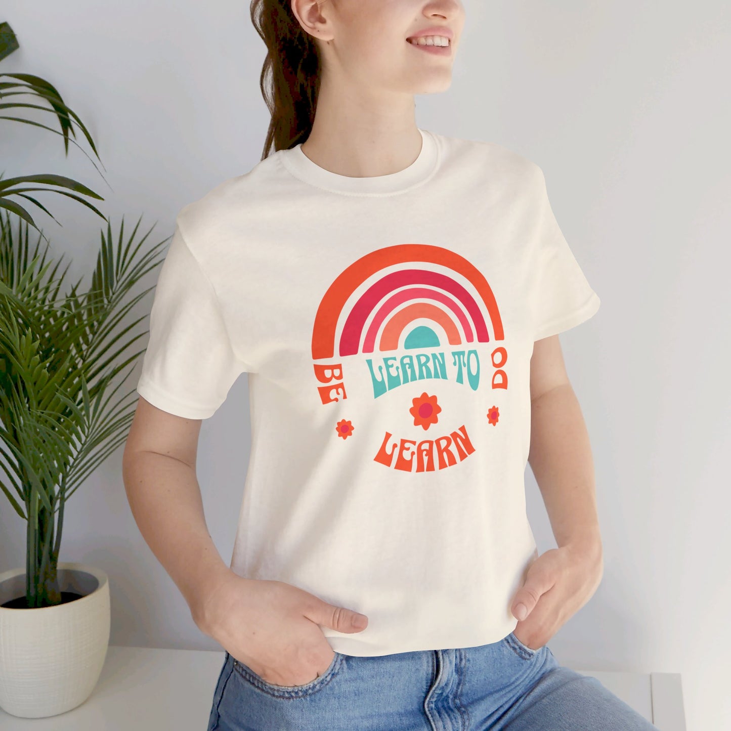 Learn to Be Rainbow Unisex Jersey Short Sleeve Tee