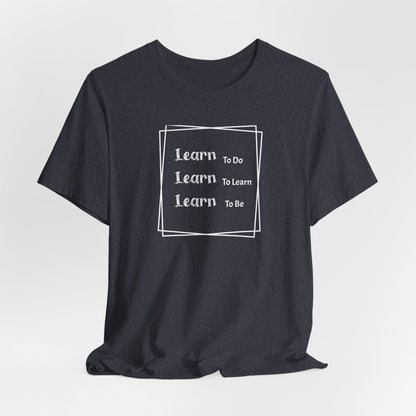 Learn to Be Unisex Jersey Short Sleeve Tee