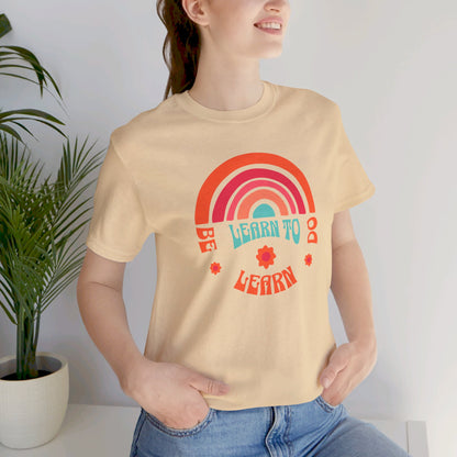 Learn to Be Rainbow Unisex Jersey Short Sleeve Tee