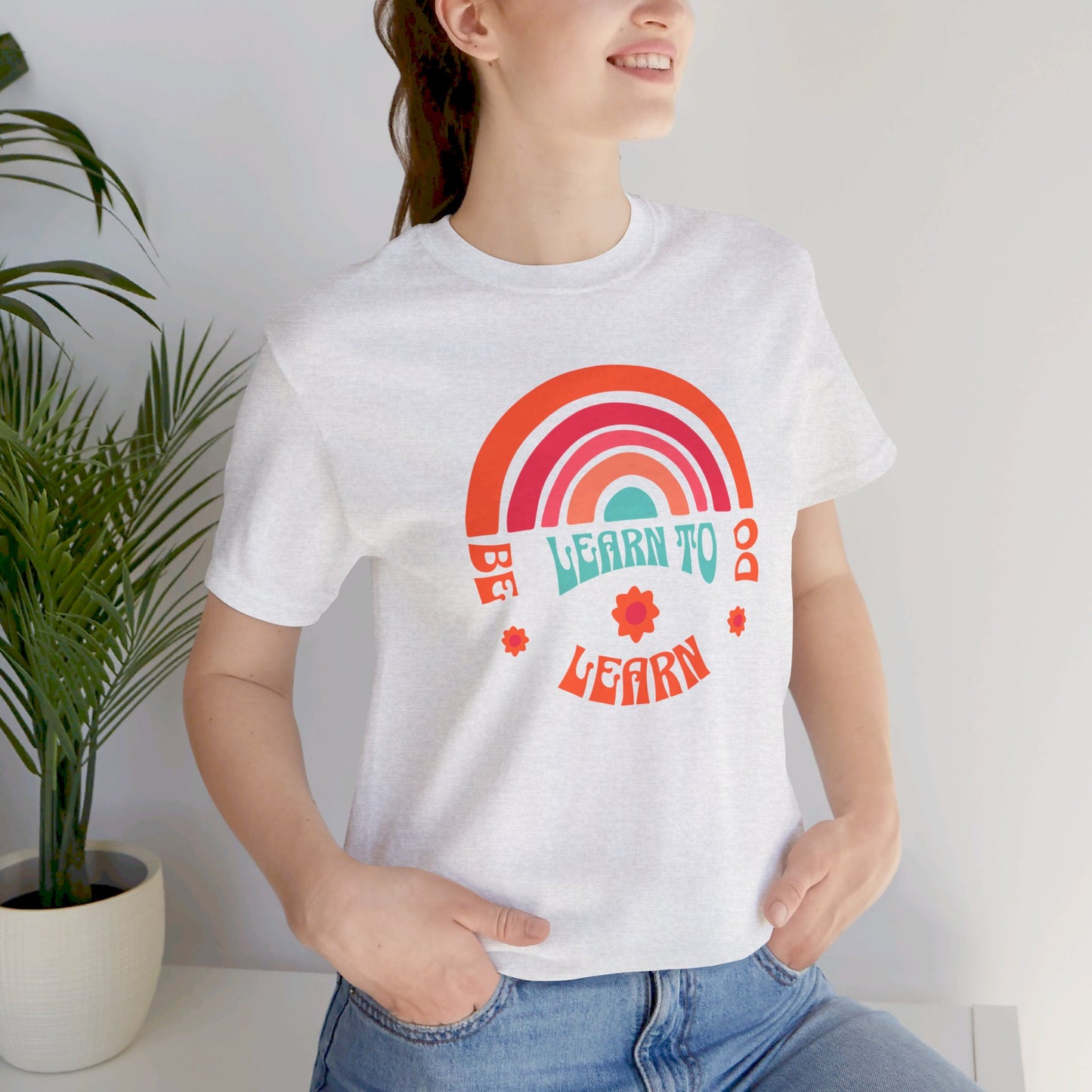 Learn to Be Rainbow Unisex Jersey Short Sleeve Tee